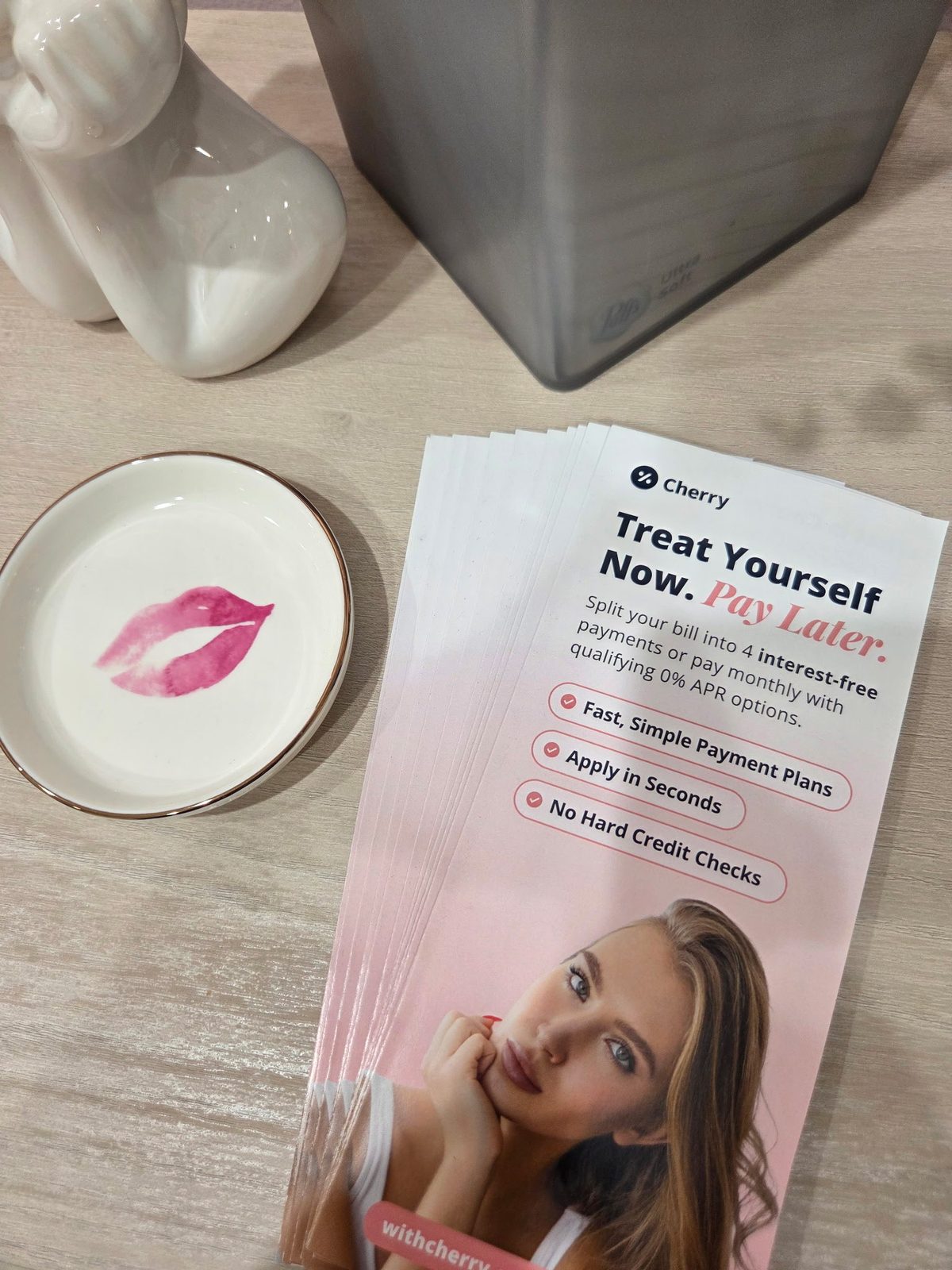 Cherry payment plan brochures on the counter at the studio
